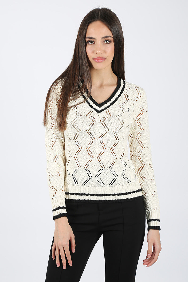 Pull à pointes brutes