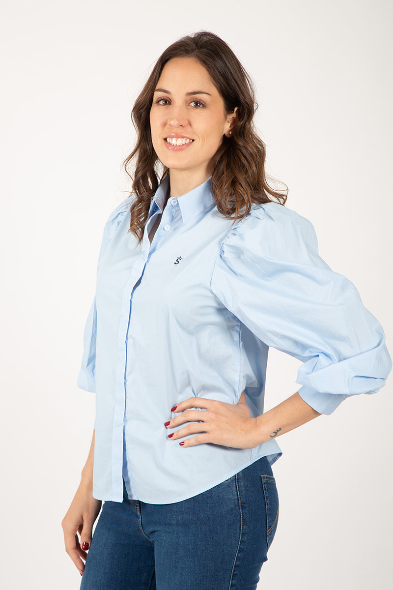 Blusa abullonada celeste