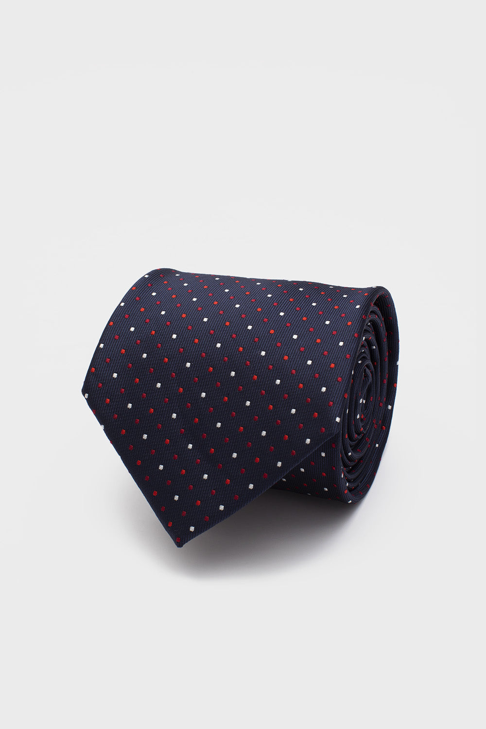 Cravate bleu marine à pois rouges