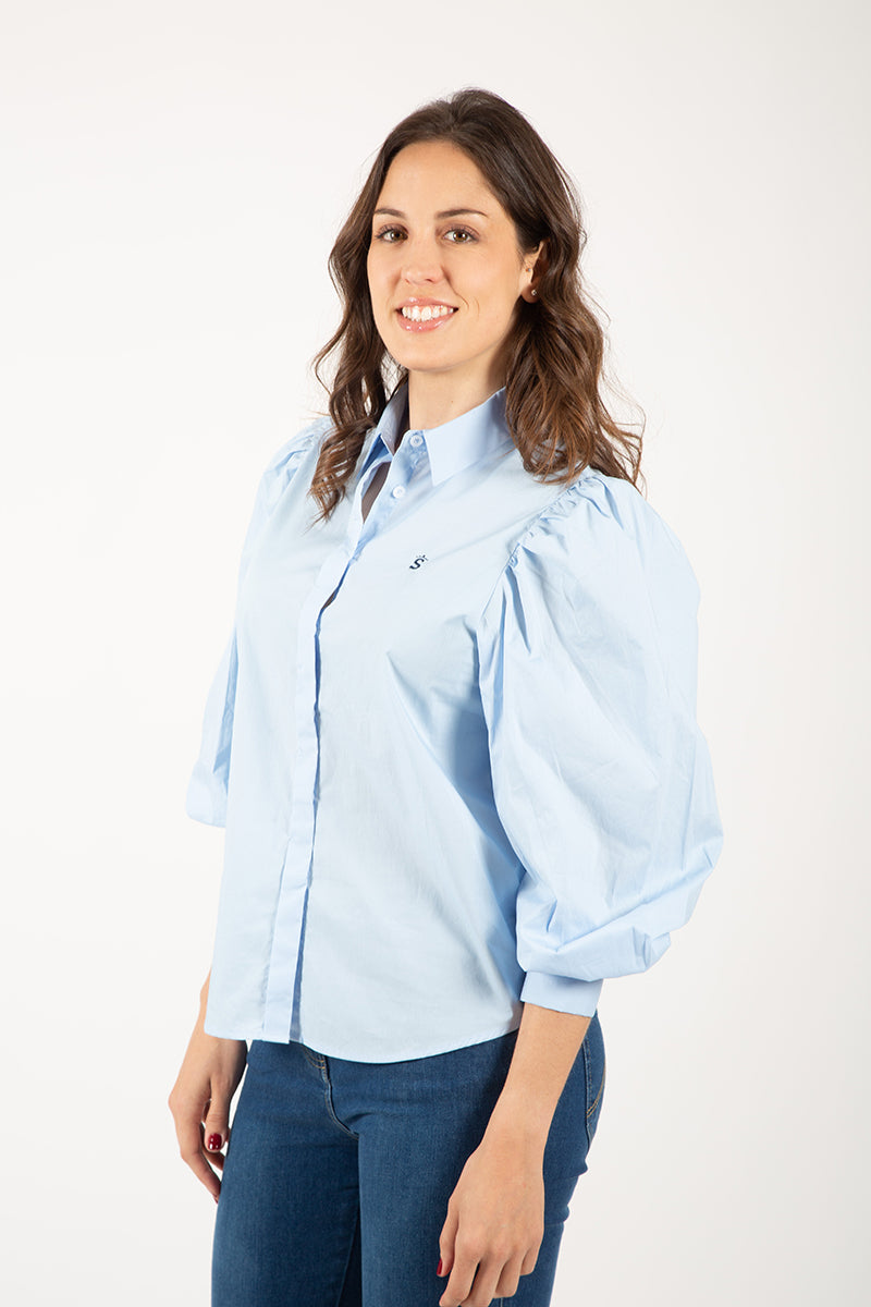 Blusa abullonada celeste